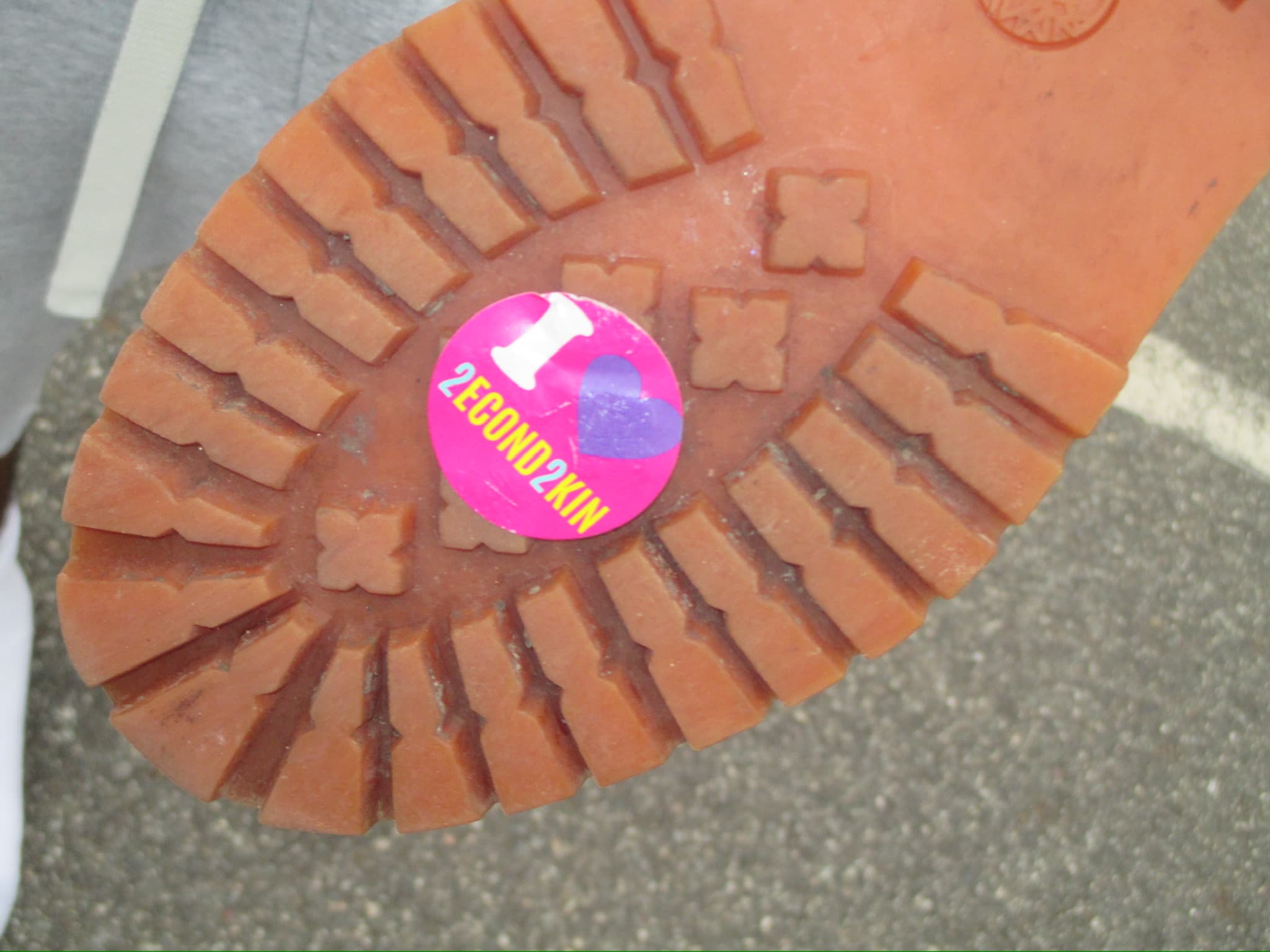 2econd2kin sticker on a boot sole